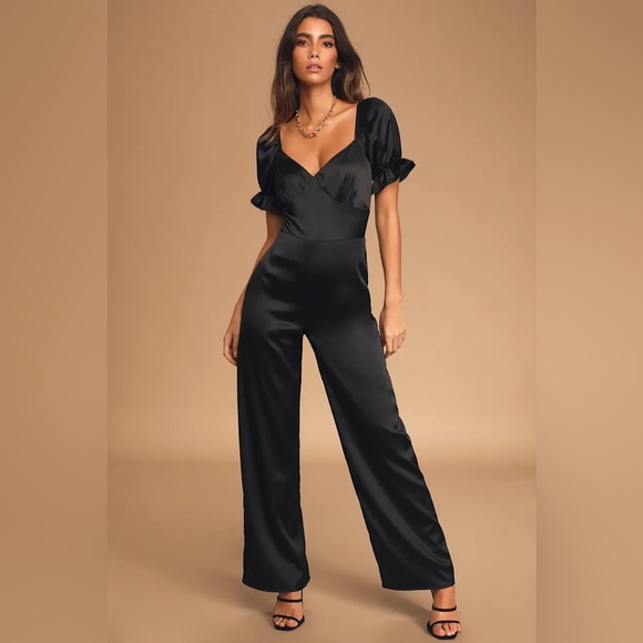 Lulus Pants - Lulu’s Black Satin Flared Pantsuit with ruffled shoulders
